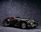 AUT 19 RK0009 05
1937 Alfa Romeo 2900B Spider 8C Black 3/4 Front View On Gray Mottled Background Studio