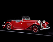 AUT 19 RK0011 01
1933 SS1 Sport Tourer Roadster Red 3/4 Front View On Gray Line Studio