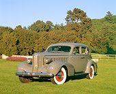 AUT 19 RK0050 01
1937 Gray La Salle 3/4 Front View On Grass By Fence And Trees Blue Sky