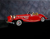 AUT 19 RK0068 02
1936 Mercedes-Benz Convertible Red 3/4 Side View Gray Marble Background