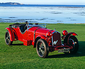 AUT 19 RK0131 05
1931 Alfa Romeo 8C 2.3 Le Mans Red 3/4 Front View On Grass By Ocean