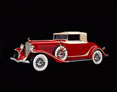 AUT 19 RK0232 01
1932 Red Auburn Cabriolet, 3/4 front in studio on black