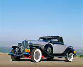 AUT 19 RK0245 11
1934 Auburn Model 1250 Gray  3/4 Front View On Pavement Blue Sky