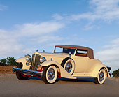 AUT 19 RK0256 04
1933 Packard V-12 Coupe White 3/4 Side View On Pavement Blue Sky