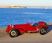 AUT 19 RK0261 04
1932 Red Alfa Romeo 8C 2300 Touring Spider 3/4 Front View By Water