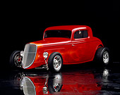 AUT 19 RK0286 03
1934 Ford Coupe Red With Flames 3/4 Front View On Mylar Floor Studio