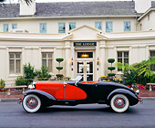 AUT 19 RK0304 10
1931 Duesenberg Model J Red And Black Convertible Profile View On Pavement By Lodge