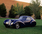 AUT 19 RK0335 04
1939 Talbot Lago 150C-SS Aerodynamic Coupe Blue 3/4 Side View On Grass