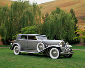 AUT 19 RK0339 04
1934 Duesenberg Model J Rollston Sport Sedan Silver Side 3/4 View On Grass