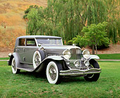 AUT 19 RK0341 01
1934 Duesenberg Model J Rollston Sport Sedan Gray Front 3/4 View On Grass