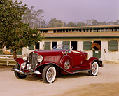 AUT 19 RK0352 03
1933 Auburn Salon Bobtail Speedster V-12 Burgundy 3/4 Side View On Dirt By Horse Salon