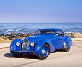 AUT 19 RK0357 04
1937 Talbot Lago Blue 3/4 Front View On Pavement By Ocean Blue Sky