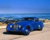 AUT 19 RK0357 05
1937 Talbot Lago Blue 3/4 Front View On Pavement By Ocean Blue Sky