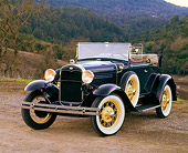 AUT 19 RK0401 01
1931 Ford Model A Deluxe Roadster Blue 3/4 Front View On Dirt By Trees And Hills