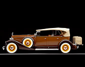 AUT 19 RK0410 06
1933 Packard Phaeton Model 1005 Duel Windshield Brown Side View On Gray Line Studio
