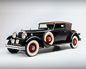 AUT 19 RK0411 04
1930 Packard 745 Rollison Convertible Victoria Black Side 3/4 View On White Seamless Studio