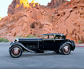 AUT 19 RK0417 02
1930 Bentley Speed Six Corsica Coupe Black Side View On Pavement By Red Rocks
