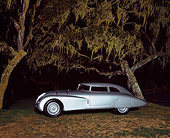 AUT 19 RK0427 03
1937 Adler Rennlimousine Competition Coupe Silver 3/4 Side View On Grass By Trees At Night Pebble Beach