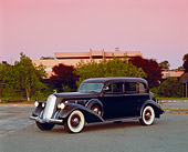 AUT 19 RK0504 01
1936 Pierce Arrow Limo Black 3/4 Side View On Pavement Trees Filtered