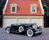 AUT 19 RK0508 01
1933 Auburn V-12 Boat-tail Speedster Black 3/4 Side View On Driveway By Garage