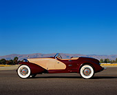 AUT 19 RK0536 03
1931 Cord L29 Speedster Burgundy And Beige Profile View On Pavement