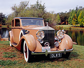 AUT 19 RK0560 01
1937 Rolls Royce 25/30 Tan And Coffee 3/4 Front View On Grass By Water