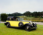 AUT 19 RK0576 07
1931 Rolls Royce Phantom II Yellow And Black 3/4 Front View On Grass