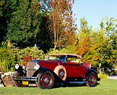 AUT 19 RK0599 01
1930 Pierce-Arrow Model B Roadster Maroon 3/4 Front View On Grass By Rocks And Trees