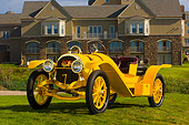 AUT 19 RK0622 01
1913 Pope Hartford Portola Roadster Yellow 3/4 Front View On Grass By Mansion
