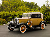 AUT 19 RK0646 01
1931 Chevrolet Landau Phaeton Cream And Brown 3/4 Side View On Pavement By Trees