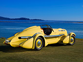 AUT 19 RK0670 01
1935 Duesenberg SJ Speedster Yellow Rear 3/4 On Grass Sky Water