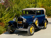 AUT 19 RK0690 01
1931 Ford Model A 400 Convertible Sedan Washington Blue Front 3/4 View On Pavement By Shrubs Trees