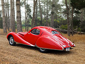 AUT 19 RK0695 01
1938 Talbot-Lago T150C SS Teardrop Coupe Red 3/4 Rear View On Dirt By Trees