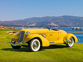 AUT 19 RK0718 01
1935 Auburn 851 Speedster Yellow 3/4 Front View On Grass By Water