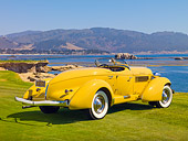 AUT 19 RK0719 01
1935 Auburn 851 Speedster Yellow 3/4 Rear View On Grass By Water