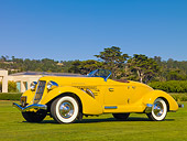 AUT 19 RK0721 01
1935 Auburn 851 Speedster Yellow 3/4 Front View On Grass