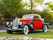 AUT 19 RK0727 01
1934 Pierce-Arrow Model 836 Convertible Red And Black 3/4 Front View On Grass By Trees