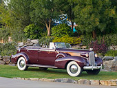 AUT 19 RK0734 01
1937 Cadillac 7529 Convertible Maroon 3/4 Front View On Grass By Trees