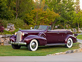 AUT 19 RK0735 01
1937 Cadillac 7529 Convertible Maroon 3/4 Front View On Grass By Trees