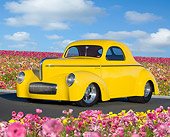 AUT 20 BK0001 01
1941 Willys Coupe Yellow 3/4 Front View On Pavement By Field Of Flowers