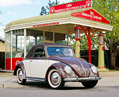 AUT 20 RK0190 01
1949 Hebmuller VW Bug Convertible Cream And Brown Front 3/4 View By Antique Gas Station