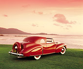 AUT 20 RK0254 02
1940 Lincoln Continental Convertible Coupe Red 3/4 Rear View On Grass By Water