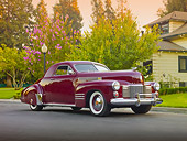 AUT 20 RK0390 01
1941 Cadillac Coupe Maroon 3/4 Front View On Pavement By Shrubs And House