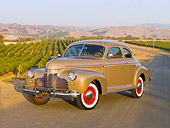 AUT 20 RK0391 01
1941 Chevrolet Master Deluxe Coupe Beige 3/4 Front View On Pavement By Vineyard