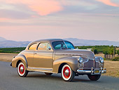 AUT 20 RK0393 01
1941 Chevrolet Master Deluxe Coupe Beige 3/4 Front View On Pavement By Vineyard