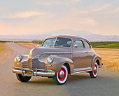 AUT 20 RK0394 01
1941 Chevrolet Master Deluxe Coupe Beige 3/4 Front View On Pavement By Vineyard