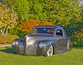AUT 20 RK0409 01
1940 Lincoln Zephyr Gray 3/4 Front View On Grass By Trees