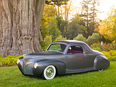 AUT 20 RK0410 01
1940 Lincoln Zephyr Gray 3/4 Front View On Grass By Trees