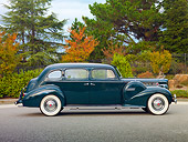 AUT 20 RK0420 01
1940 Packard 160 Touring Sedan 1804 Green Profile View On Pavement By Trees