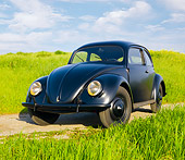 AUT 20 RK0423 01
1946 Volkswagen Beetle Black 3/4 Front View On Dirt Road By Field